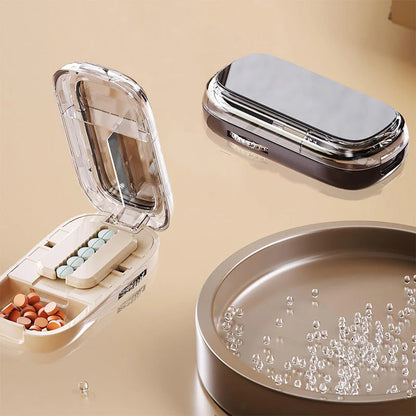 Prenosná krabička na lieky s rezačkou