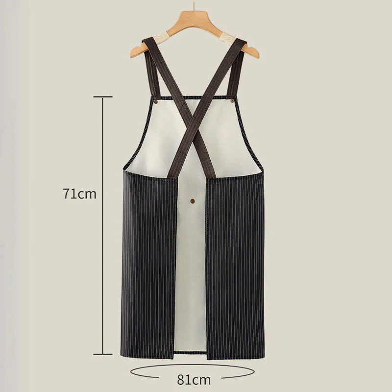 Nepremokavá zástera s krížovými popruhmi na chrbte a odnímateľným uterákom na ruky